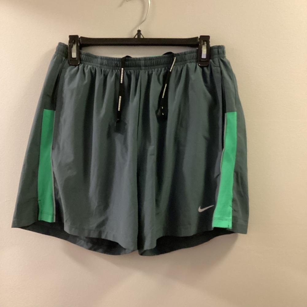 Nike shorts with attached undergarment Woman’s large gray and green